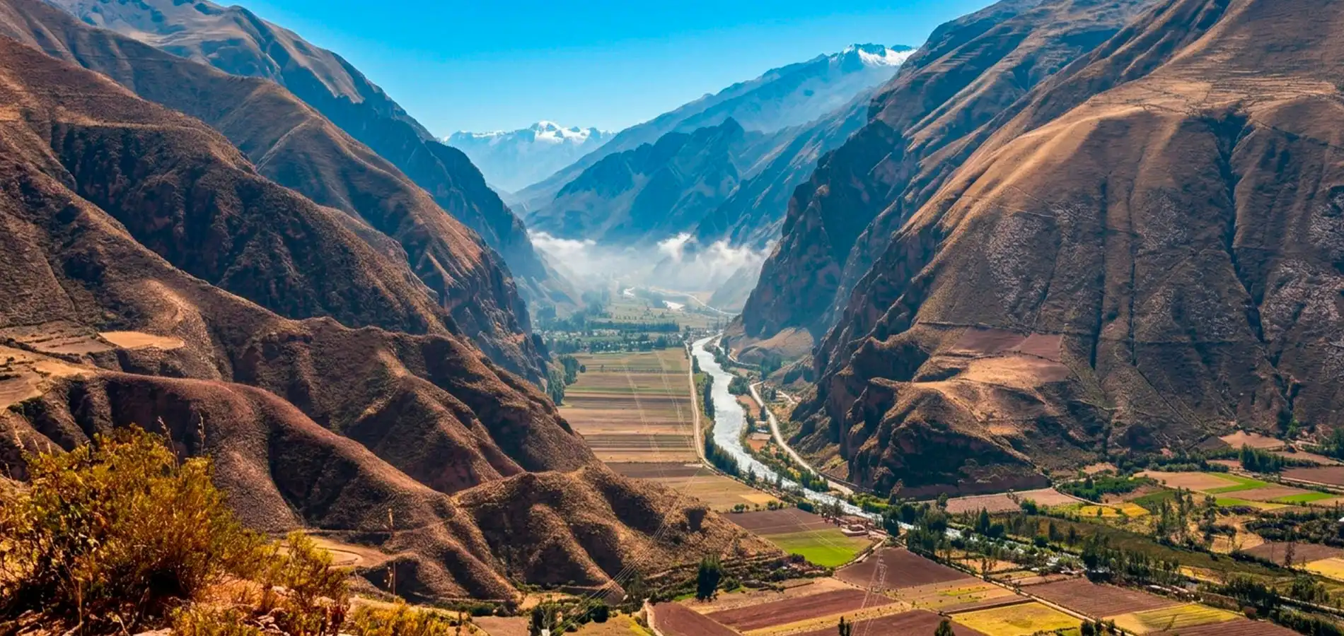Scenic view of the Sacred Valley of the Incas near Cusco, Peru, with mountains and a winding river